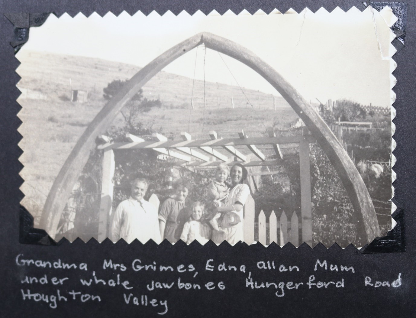The Miller family at Houghton Bay, under the whale bone entrance, late 1920s.