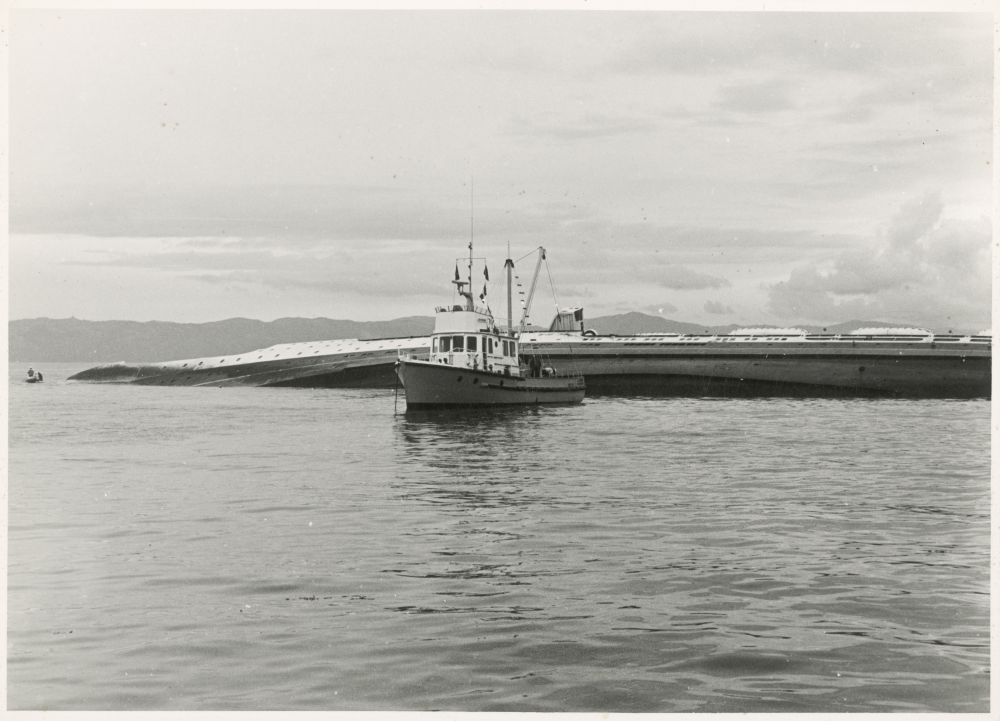 Wreck of TEV Wahine with Marine Department launch "Enterprise" alongside.