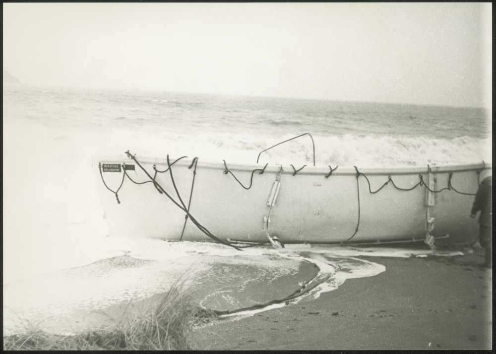 Empty lifeboat ashore at Seatoun after wreck of TEV Wahine.