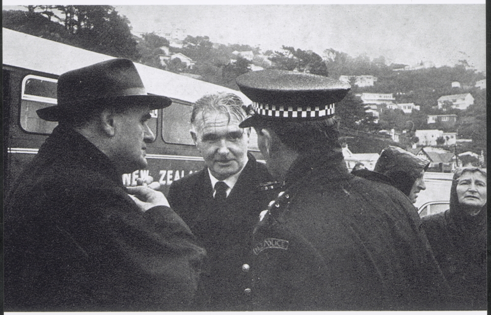 Captain Robertson conferring with Marine Superintendent of Union Steam Ship Company, Captain Arthur Crosbie and a police officer