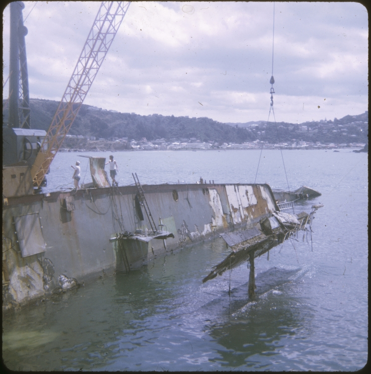 A crane lifting a piece of the TEV Wahine wreck out of the water