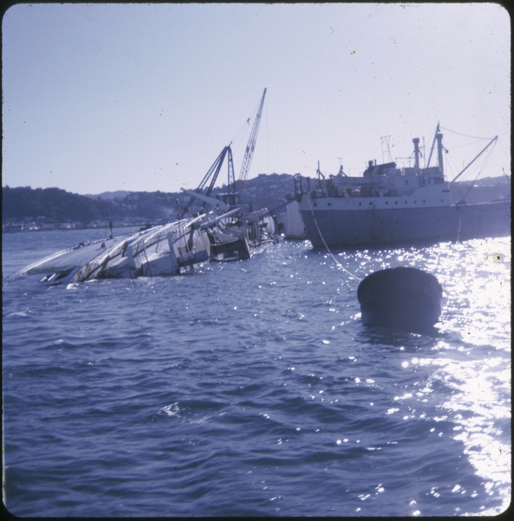 The salvage vessel Holmpark along side of the TEV Wahine wreck.
