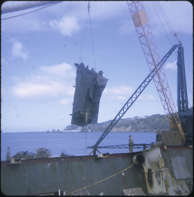 A piece of the TEV Wahine wreck lifted by a crane