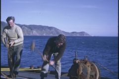 Two men on the TEV Wahine wreck during the salvage operation