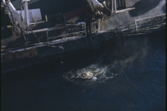 Divers gas cutting under the water line of the TEV Wahine wreck
