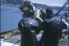 Two men aboard the TEV Wahine wreck during the salvage
